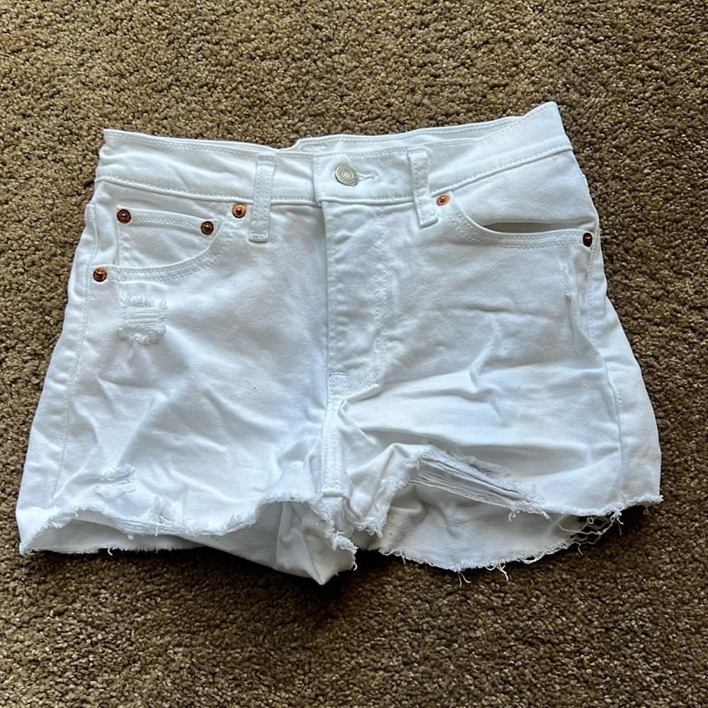 Levi’s White Denim Distressed Shorts